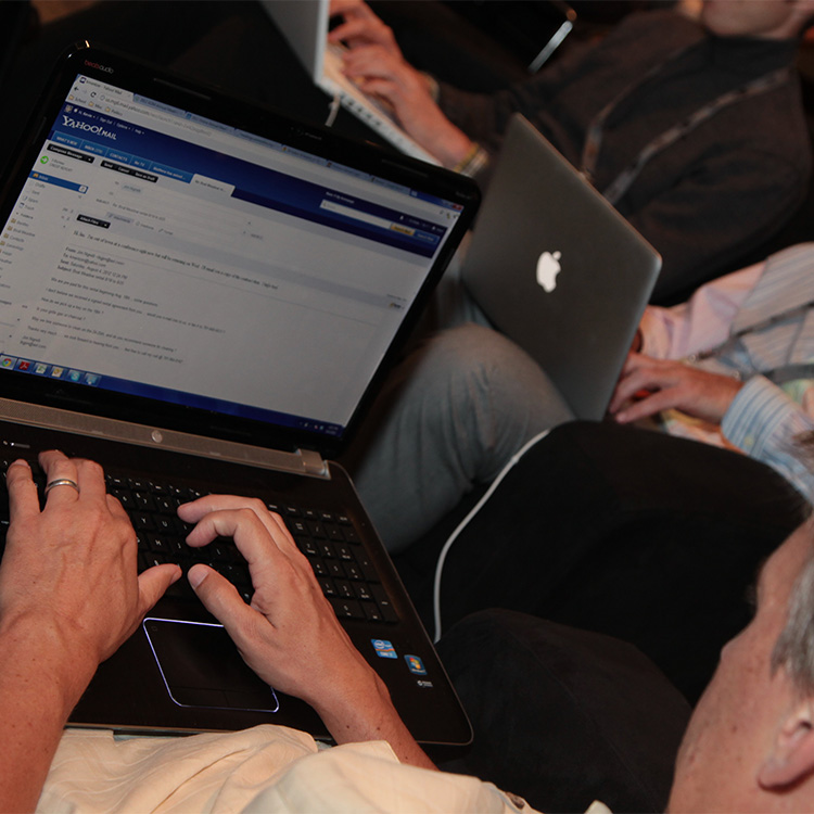 Attendees check email at Annual Meeting 2012